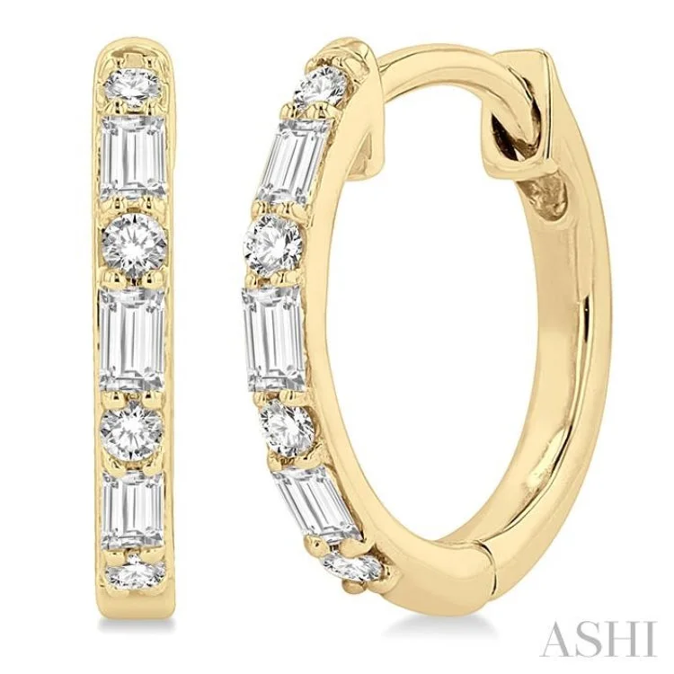 Ladies silver hoop earrings-1/4 ctw Petite Baguette and Round Cut Diamond Fashion Huggies in 10K Yellow Gold