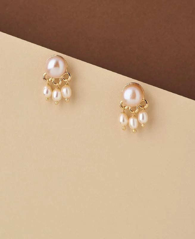 Ladies designer earrings-Standout Golden Pearl Hanging Earring