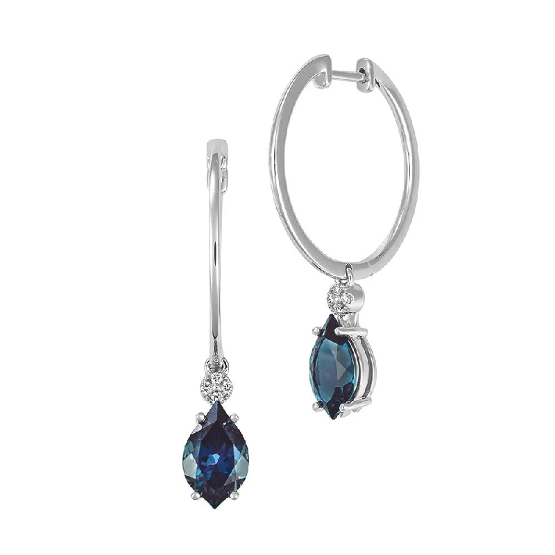 Ladies gemstone hoop earrings-14K white gold hoop earrings featuring 10x6mm flame-cut Chatham lab grown alexandrite with Chatham lab grown diamond accents.