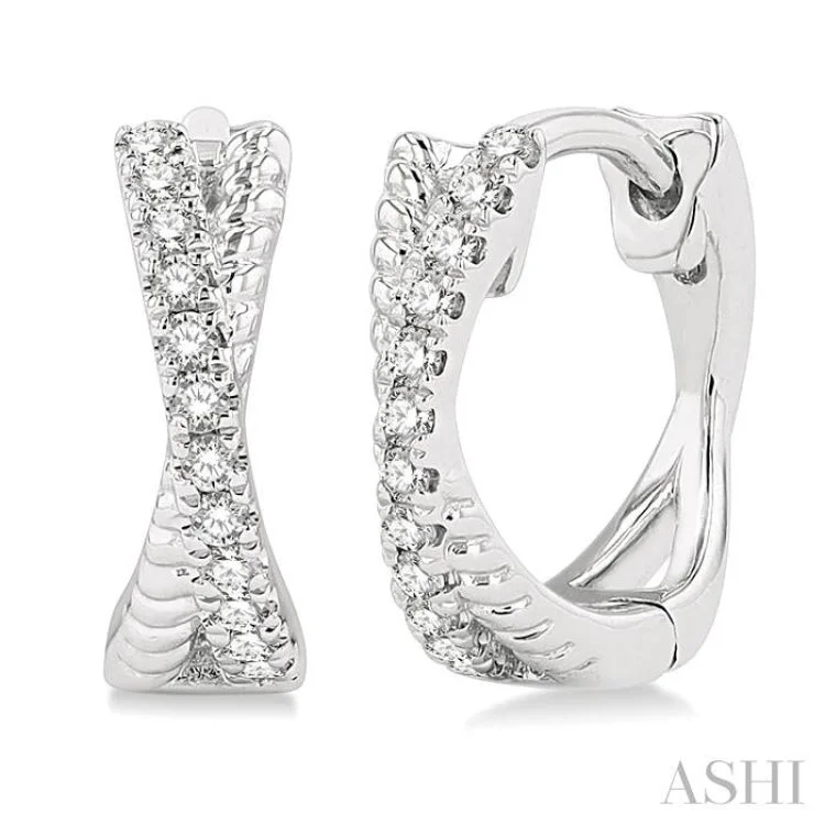 Ladies trendy hoop earrings-1/6 ctw Petite Crisscross Rope and Round Cut Diamond Fashion Huggies in 10K White Gold